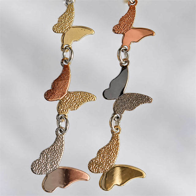 Multi Tone Butterfly Cascade Drop Earrings