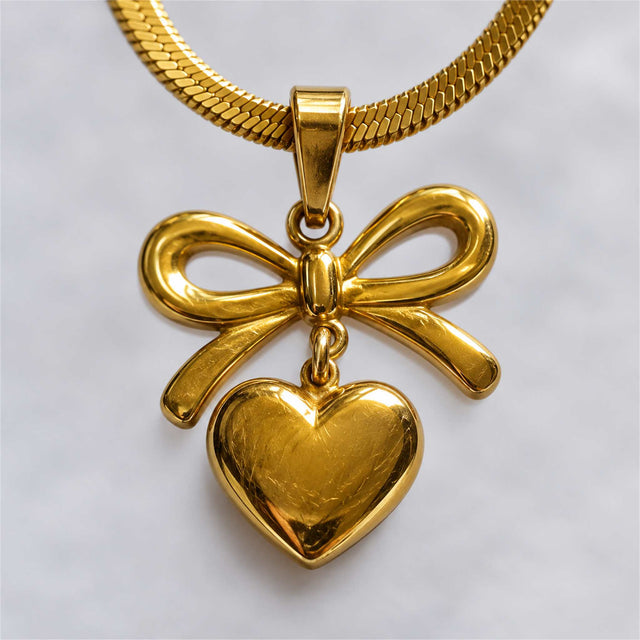 Gold Bow Heart Pendant Herringbone Necklace