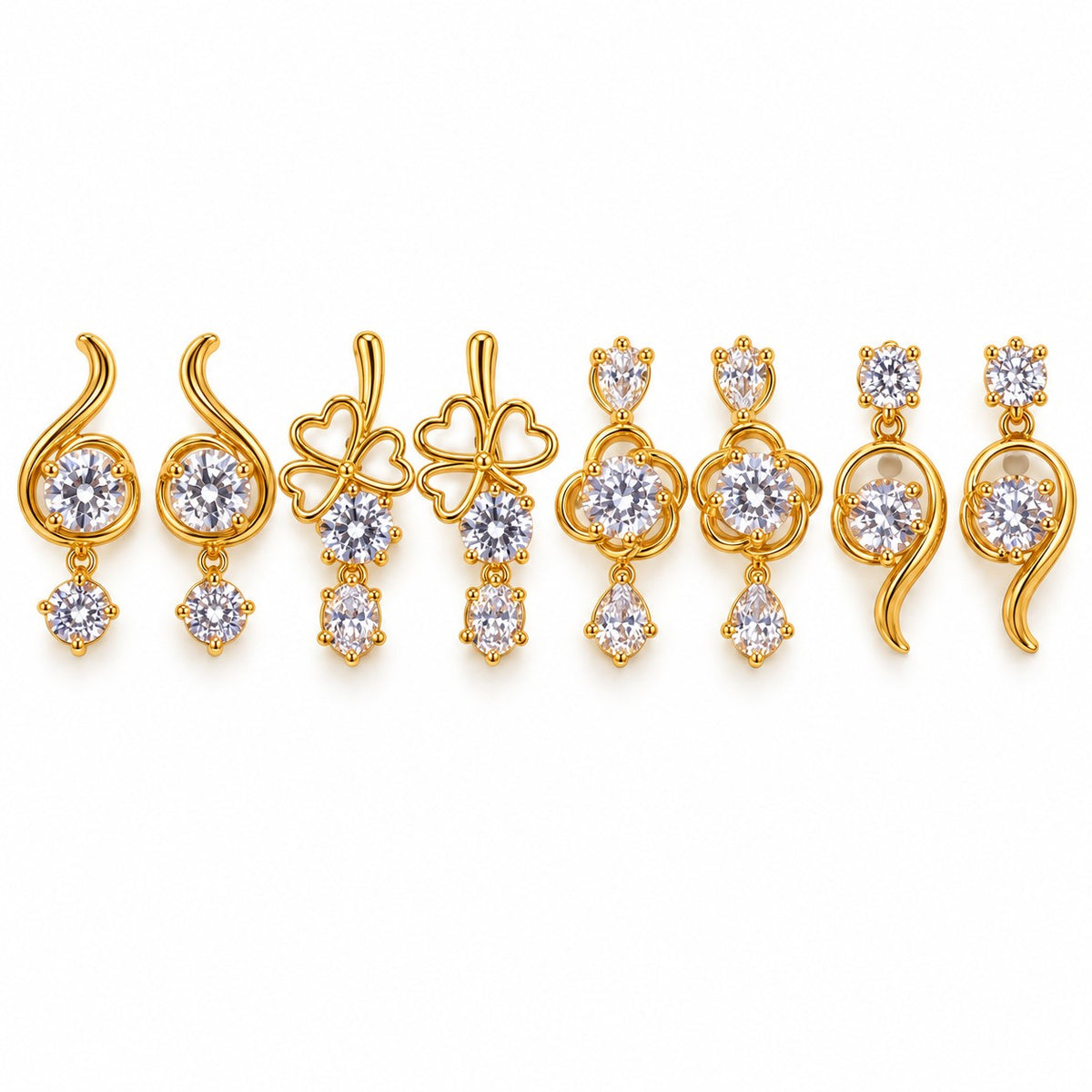 Gold AD stone drop earrings in assorted swirl, clover and flower designs on a white background