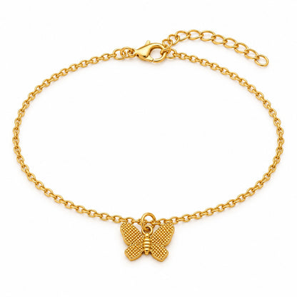 Gold butterfly charm bracelet with a textured butterfly charm on a white background