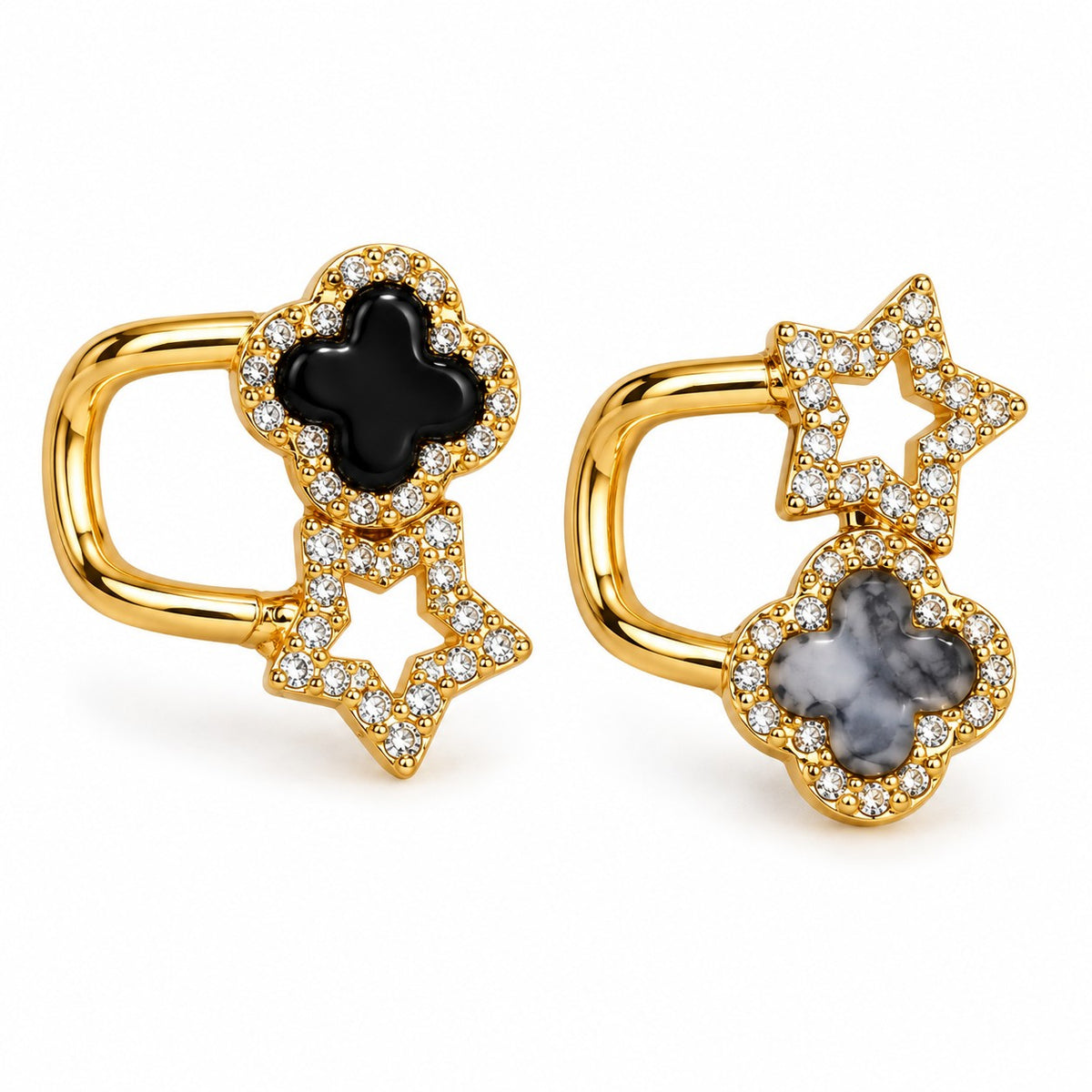 Gold clover and star huggie hoop earrings for women, mismatched pair on a white background