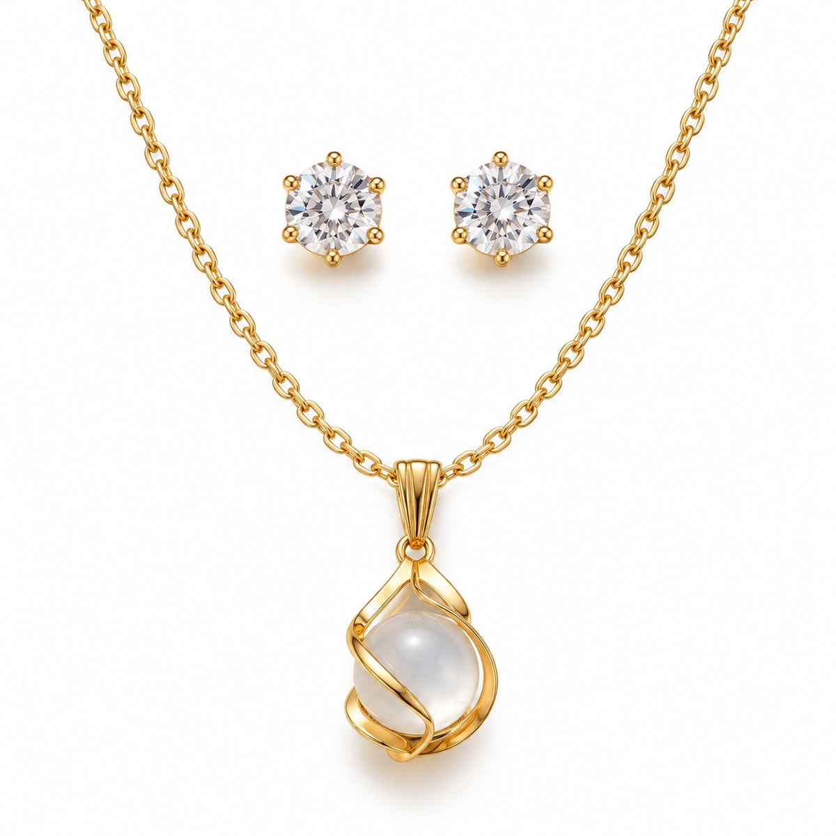 Gold moonstone pendant necklace with crystal stud earrings set on a white background