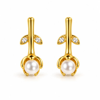 Gold rosebud pearl drop earrings for women on a white background