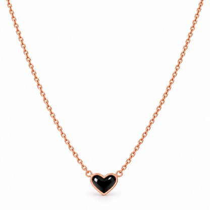 Rose gold black heart pendant chain necklace for women on a white background