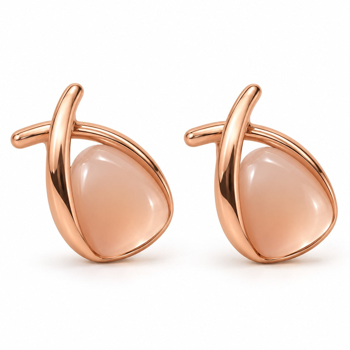 Rose gold crossover peach stone stud earrings for women on a white background