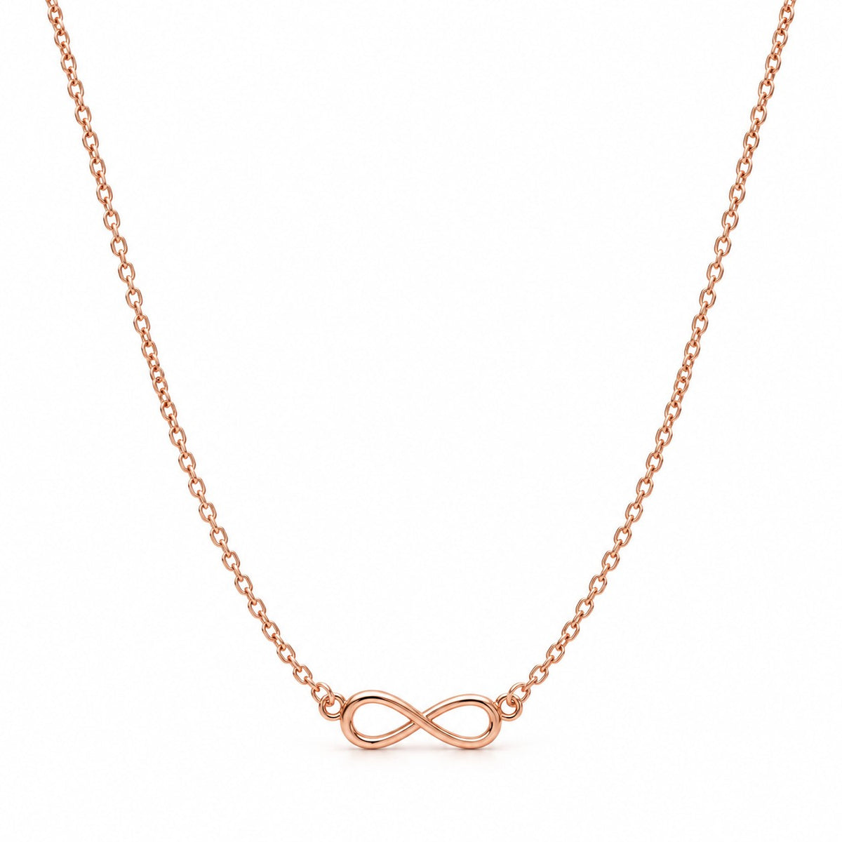 Rose gold infinity pendant chain necklace with sideways infinity on a white background