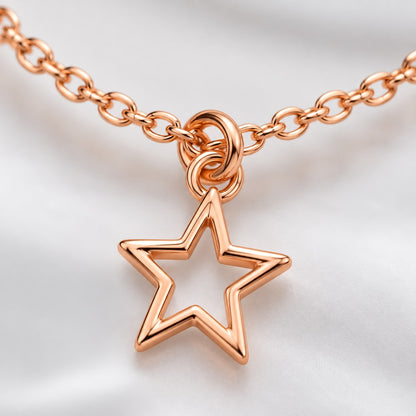 Close-up of the open star charm on the rose gold star charm bracelet