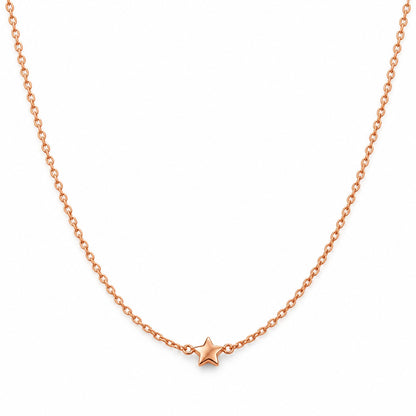 Rose gold star pendant chain necklace for women on a white background