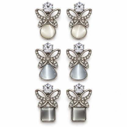 Silver butterfly cat eye stone drop earrings in round, triangle and square designs on white