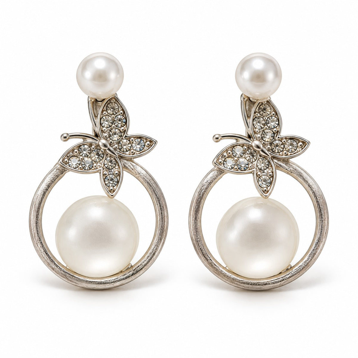 Silver butterfly pearl circle drop earrings with crystal butterfly on a white background
