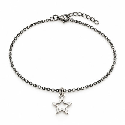 Silver star charm bracelet with an open star on a fine dark chain on a white background